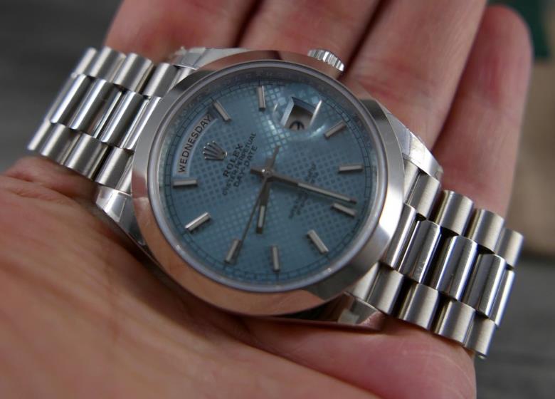 The 40mm replica watch has ice blue dial.